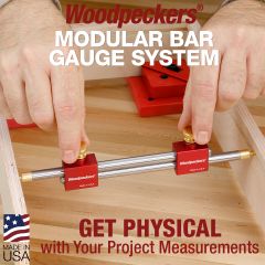 Modular Bar Gauge measuring diagonals in assembled picture frame.
