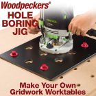 Hole Boring Jig in use creating 20mm holes on 96mm centers with plunge router. 
