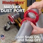 Connecting the planer to dust collection using the two in-line MagQuick dust ports with a dust port installed on the jointer in the background. 